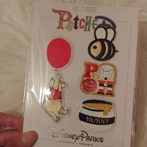 🍯FIRM! NWT DISNEY PARKS WINNIE THE POOH 4 PIECE ADHESIVE PATCH SET